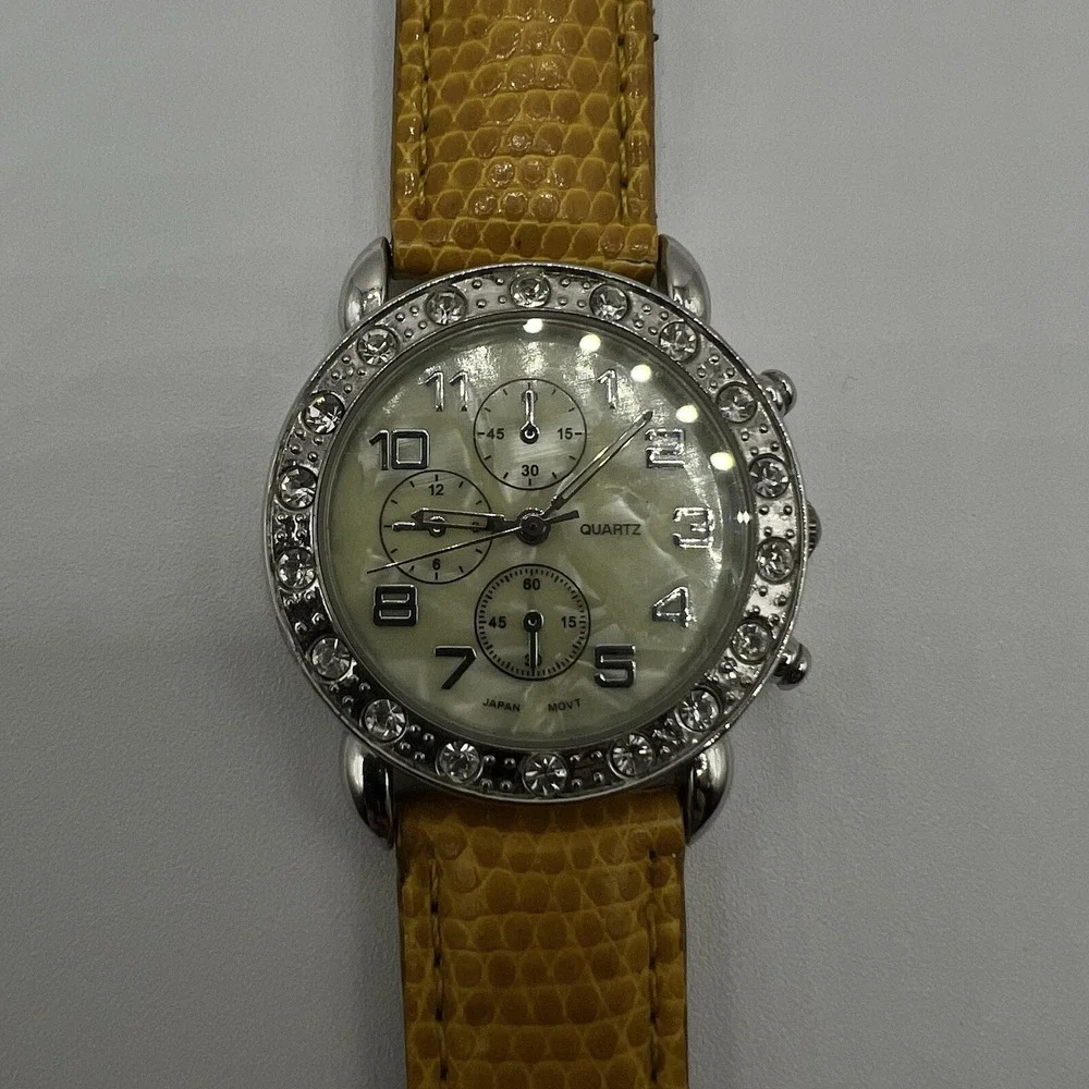 CG Women's Quartz Watch Rhinestone Bezel MOP Dial Plastic Band Needs New Battery